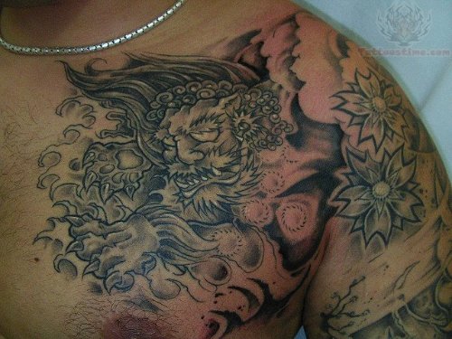 Flowers And Foo Dog Tattoo On Chest